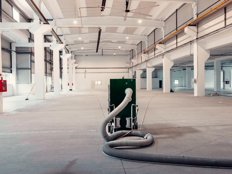 cleaning floors during construction